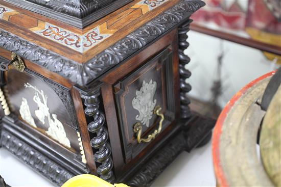 A 19th century Flemish ebony and rosewood table top cabinet, 19.5in.